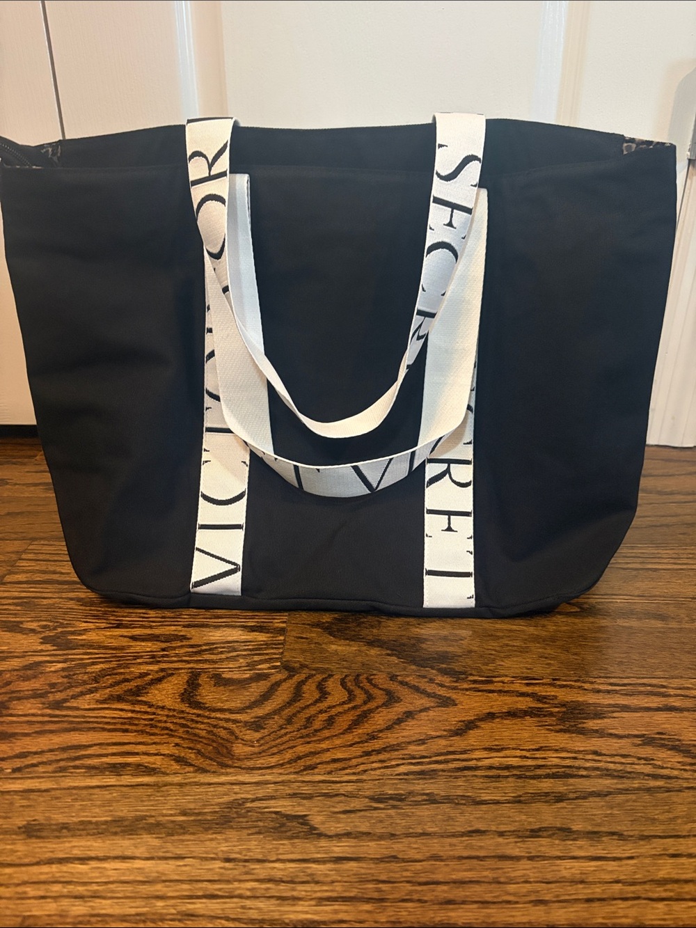 Victoria’s Secret Black Canvas Tote with White Logo Straps zippered top closure